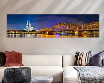 Cologne Cathedral and Hohenzollern Bridge at night by Günter Albers