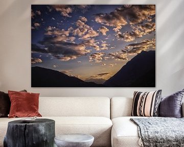Clouds with mountain scenery by Hans van Oort