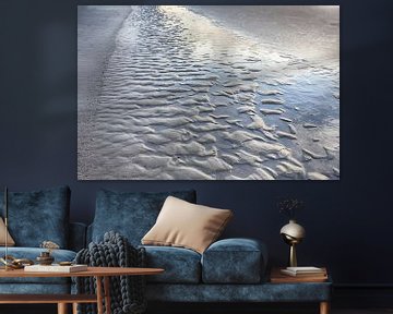 Ridges along the beach with reflective seawater by Ronald Smits