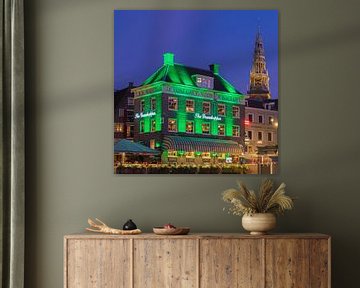 The Grasshopper en de Oude Kerk, Amsterdam. van Henk Meijer Photography