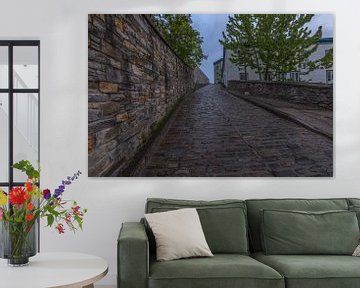 City walls and cobbled road in Quebec, Canada by Maarten Hoek