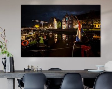 Illuminated houses on the Thorbeckegracht in Zwolle during the evening by Fotografiecor .nl