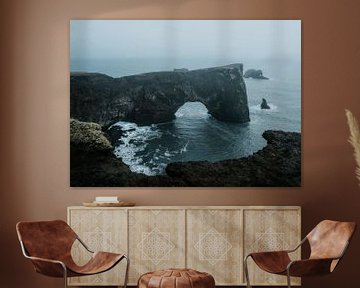 Arch in iceland near black sand beach by Thomas Kuipers