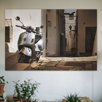 Vespa scooter in an alley in Italy