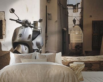 Vespa scooter in an alley in Italy by iPics Photography