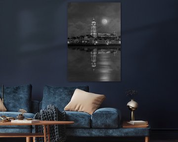 Statue of Deventer tower and the river IJssel with moonshine. by Bart Ros