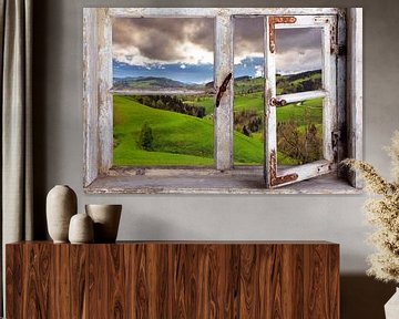 Blick durch ein Fenster in die Landschaft von Jürgen Wiesler