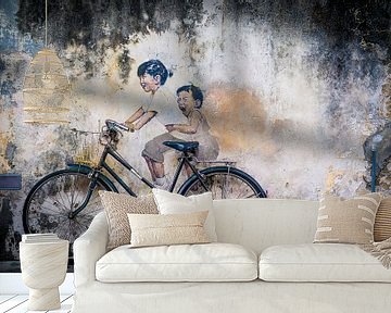 Street art Malaysia, little children on a bike by Ellis Peeters