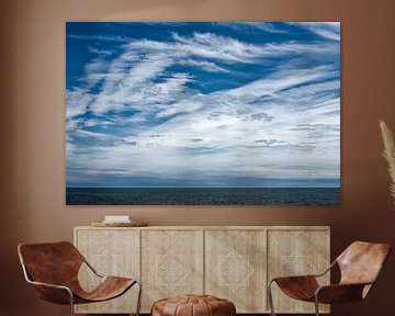 Wolkenspel boven zee van Hans Kwaspen