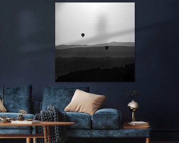 Balloon flight in the early morning in Tuscany by backlight by John Trap