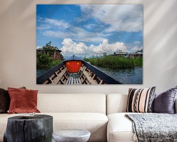 On a boat in Myanmar (Burma) with a view of stilt houses. by Sofie Duchateau