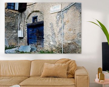 facade with blue door in Fouillouse by Hanneke Luit