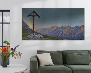 Rainbow and mountain cross by Walter G. Allgöwer