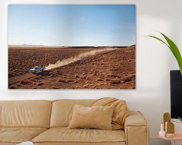 SA12501547 Pick-up truck driving in the desert by BeeldigBeeld Food & Lifestyle