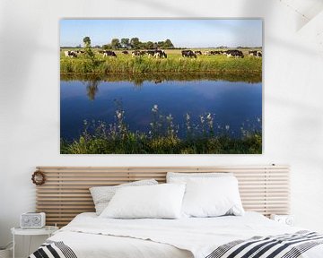 Koeien in Nederlands landschap met water van Ger Beekes