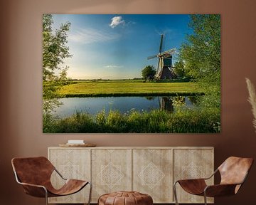 Polder landscape Windmill in the last light by Coen Weesjes