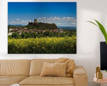 Ruin with a field of linseed flowers in the foreground. by Louis Kreuk