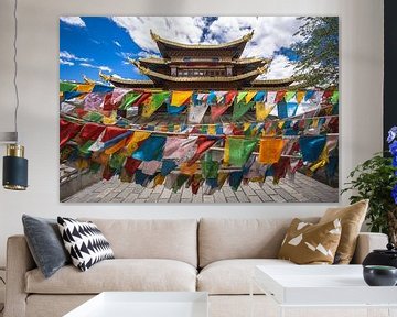 Prayer flags hanging in front of a temple in Shangri-La City (China). by Claudio Duarte