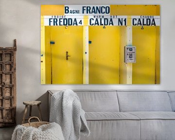 Yellow douche cabins in Italy with hot and cold in Italian by Wijnand Loven