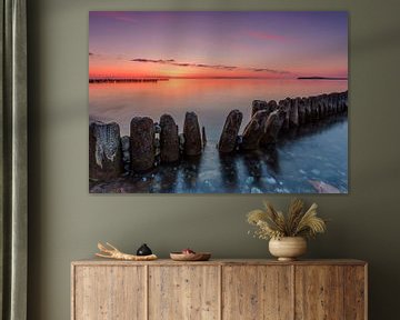 Groynes at sunset by Frank Herrmann