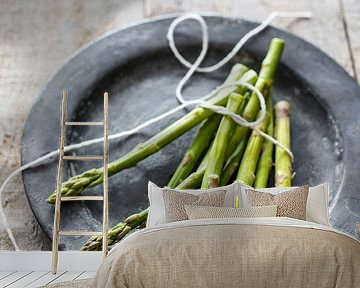 12306431 Fresh asparagus on a tin plate by BeeldigBeeld Food & Lifestyle