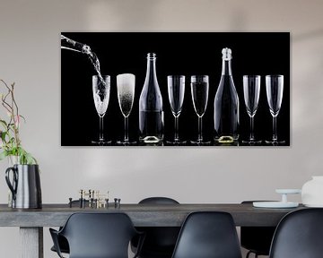 Bottles and glasses of champagne in dark setting by Atelier Liesjes