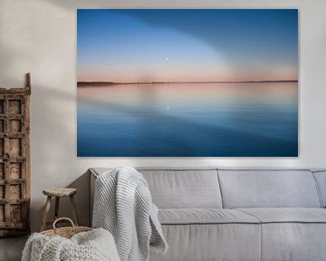 The turquoise lake at dawn. smooth blue and turquoise lake surface at dawn, red and orange and sky b by Michael Semenov