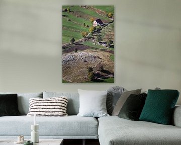 Beautiful and cozy white lonely reclusive house surrounded by green fields in early autumn, Monteneg by Michael Semenov