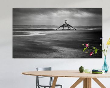 The cape on the beach of Vlieland during a rainy day by Hans de Waay
