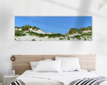 Sand dunes with dune grass near the sea on a summer day by Sjoerd van der Wal Photography