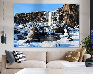 Winter waterfall in Iceland by Mickéle Godderis