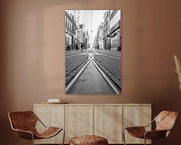 Almost deserted Leidsestraat shopping street in Amsterdam