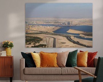 Uitzicht over woestijnstad Dubai van Edsard Keuning