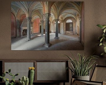 Reception hall with arches and fireplace by Perry Wiertz