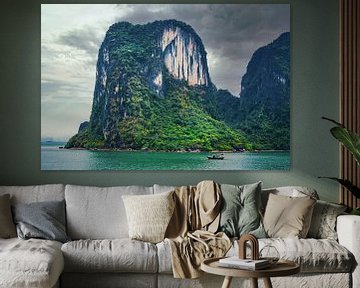 Impressive rock in Halong Bay with fishing boat, Vietnam