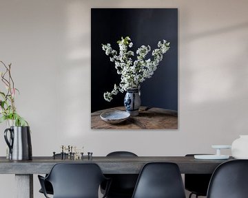 still life with cherry blossom on wood