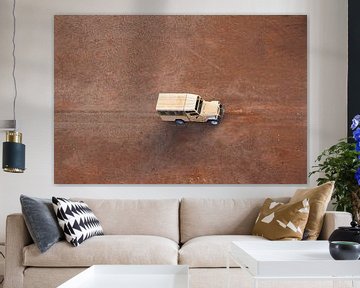 Car from above in the desert Namibia by Bobsphotography