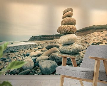 stacked stones on stone beach by Bert Nijholt