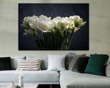 Flowering white peony tulips on the vase by Idema Media