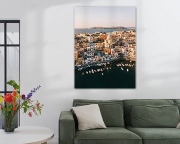 View of the port of Procida from the air with Ischia in the background