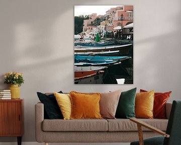 Coloured fishing boats in the port of Procida with the boulevard in the background by Michiel Dros