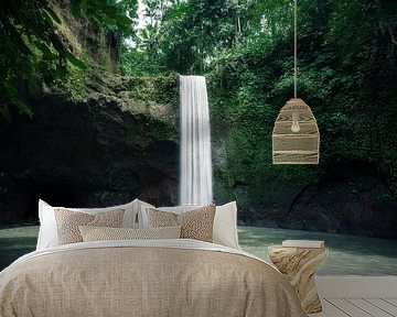 Waterfall in the jungle in Bali by road to aloha