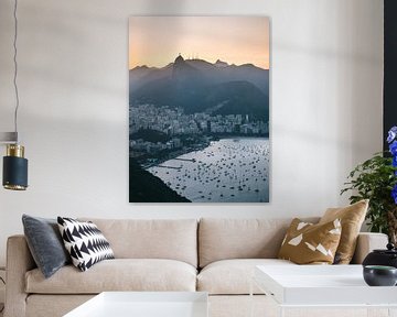 View over Rio de Janeiro at sunset with sailboats and Christ by Michiel Dros