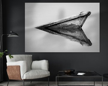 Black and white reflection of an old sunken boat by Ellis Peeters