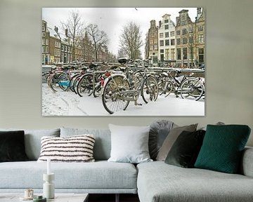 Winter auf den Amsterdamer Kanälen in den Niederlanden von Eye on You