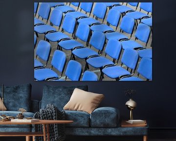 Des chaises bleues dans une arène sur Lars-Olof Nilsson