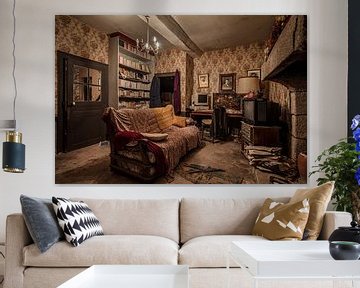 Living room in dilapidated house by Inge van den Brande