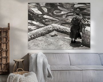 Monk in Karsha Monastery overlooks the fields in the valley by Affect Fotografie