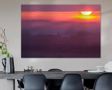 Zonsopkomst boven duinen met mist van Menno van Duijn