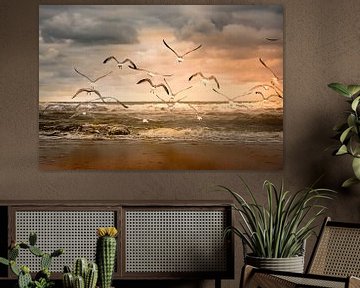 flying seagulls above the beach by Marinus Engbers